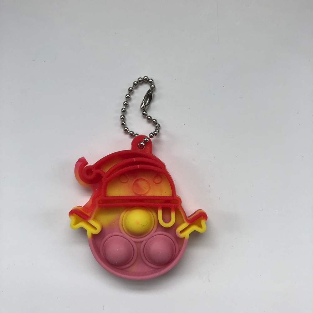Free with purchase - small snowman pop it keychain